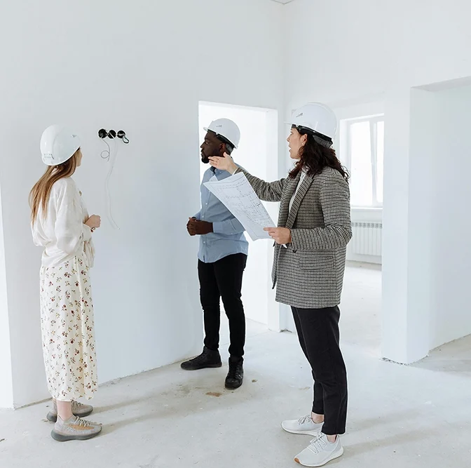 Construction team reviewing drywall work - professional drywall services Mississauga by Express Drywall Services.