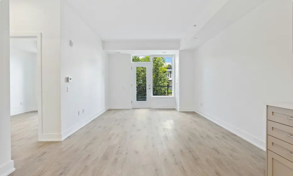 finished interior with new drywall and large glass doors