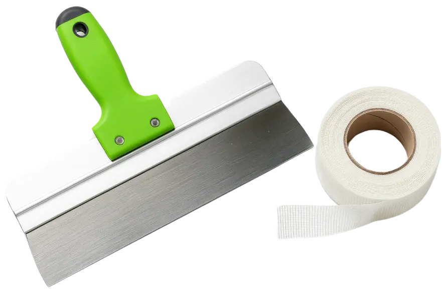 drywall taping knife and joint tape on clean surface