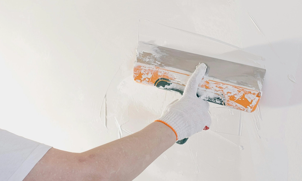 Smooth wall finishing during drywall services Vaughan by Express Drywall Services.
