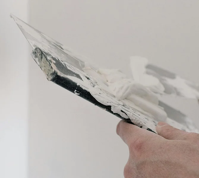 Taping and mudding in progress during drywall services Etobicoke by Express Drywall Services.