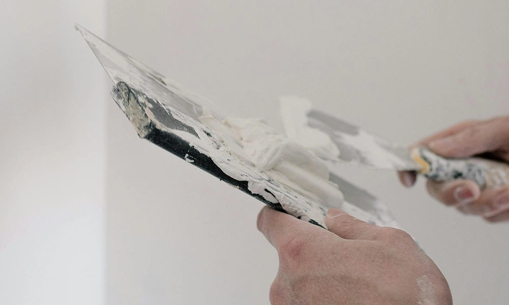 Taping and mudding in progress during drywall services Etobicoke by Express Drywall Services.