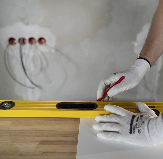 Accurate wall layout work during drywall services Newmarket by Express Drywall Services.