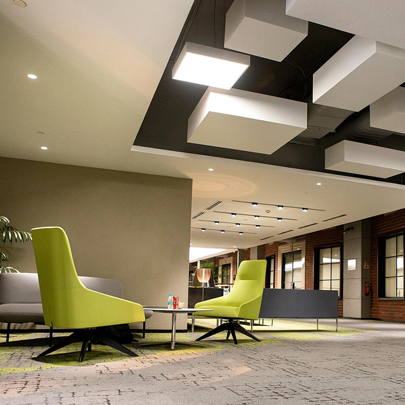 Basement lounge designed using moisture-resistant drywall installation and tile backer by Express Drywall Services