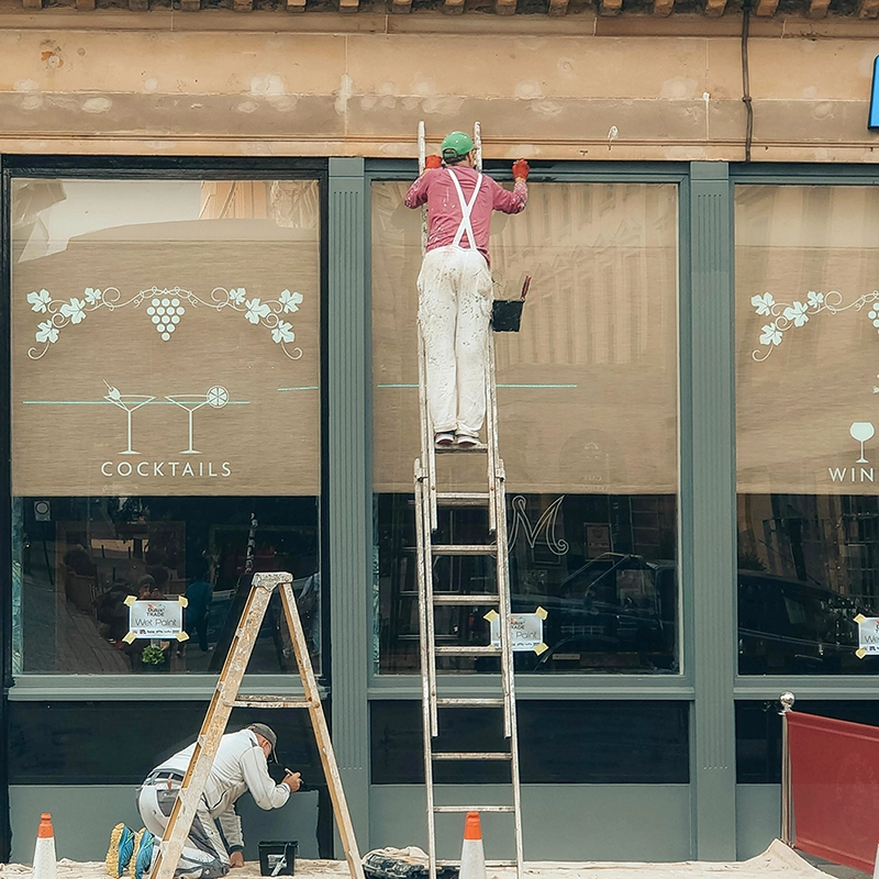 Exterior priming and painting in progress – Express Drywall Services