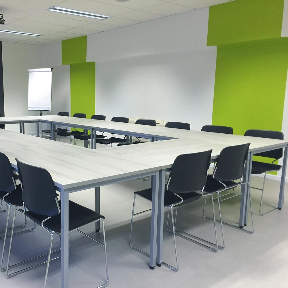 FRP installation in educational facility with clean, bright wall finishes by Express Drywall Services.