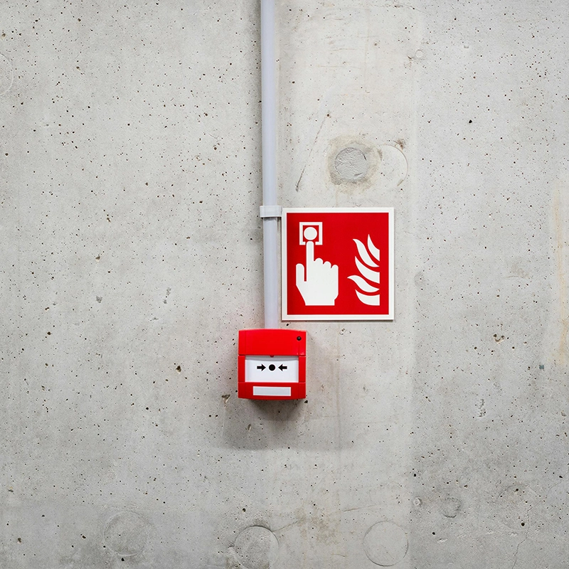 Concrete wall housing fire system infrastructure, prepped for shaft wall assembly.