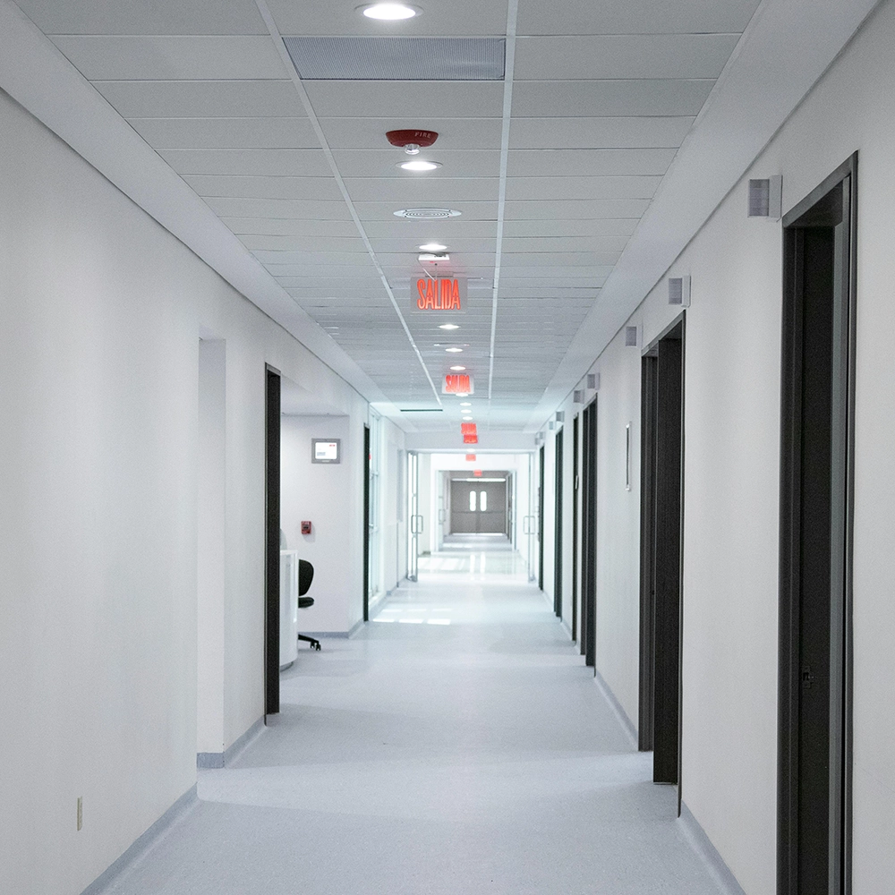 FRP installation for high-use healthcare corridor walls by Express Drywall Services.