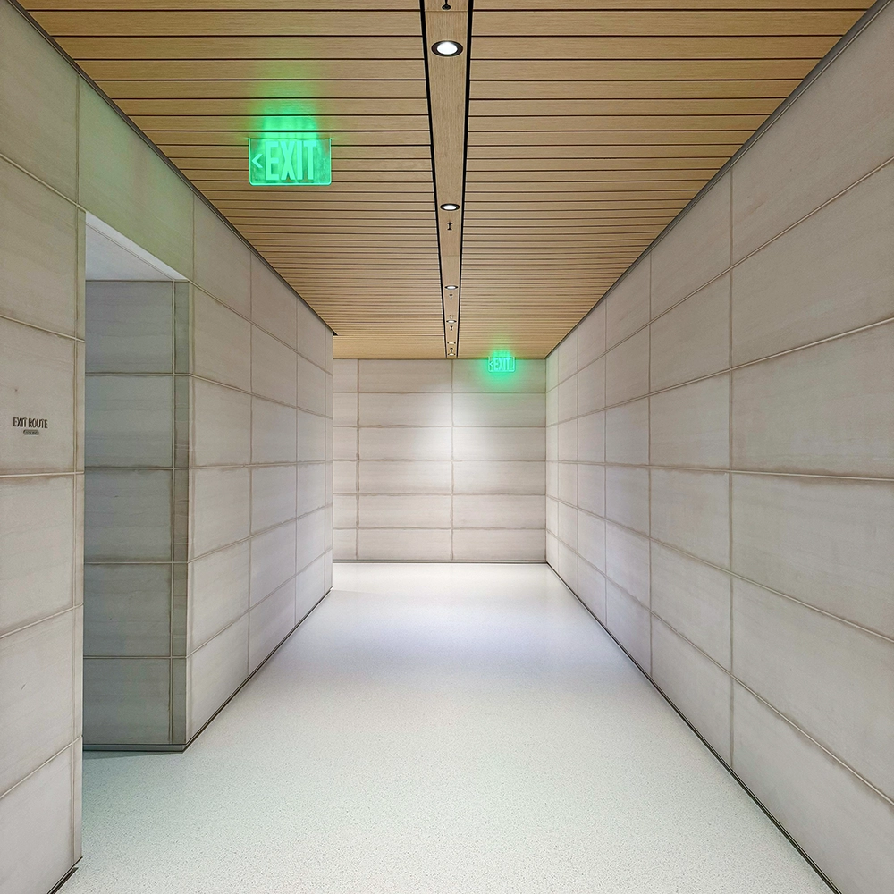 Fire and sound separation solutions by Express Drywall Services enhance safety in residential hallways and exit paths.
