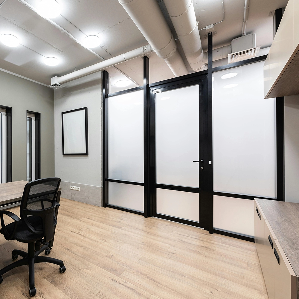 Interior office with finished access door installation by Express Drywall Services.