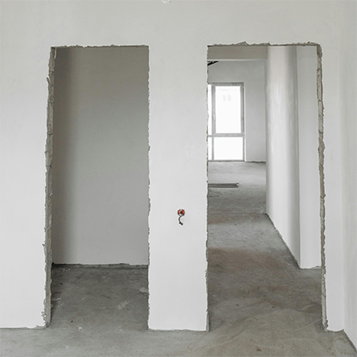 Drywall framing prepared for future access door installation by Express Drywall Services.