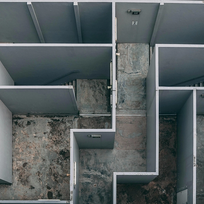 Aerial view of wall framing for commercial fire and sound separation by Express Drywall Services.