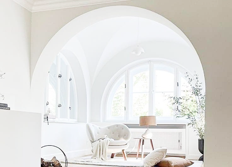 Arched living space created with custom archways and designs by Express Drywall Services