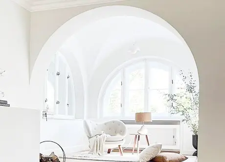Arched living space created with custom archways and designs by Express Drywall Services
