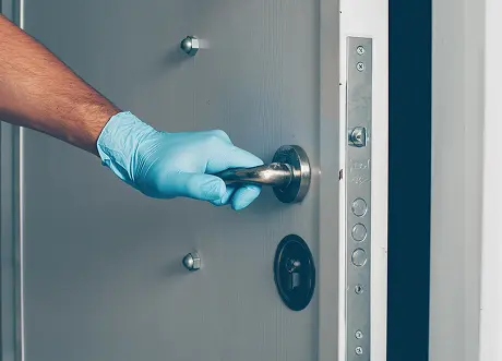 Hand opening secure metal door - commercial metal door installation by Express Drywall Services.