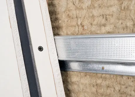 Wall assembly during resilient channel installation by Express Drywall Services