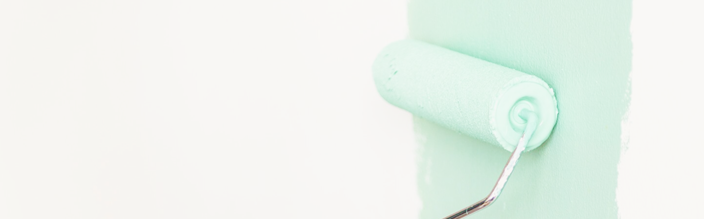 Fresh coat of mint-colored paint applied during priming and painting by Express Drywall Services