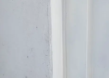 Uneven corner finish before drywall taping and mudding by Express Drywall Services.