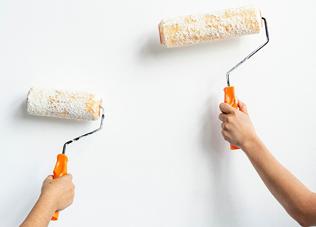 Two rollers used for commercial priming and painting by Express Drywall Services.