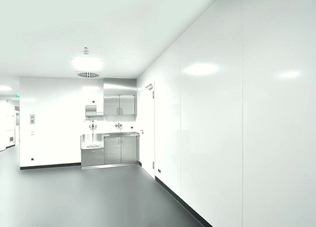 Bright commercial space with full FRP installation by Express Drywall Services