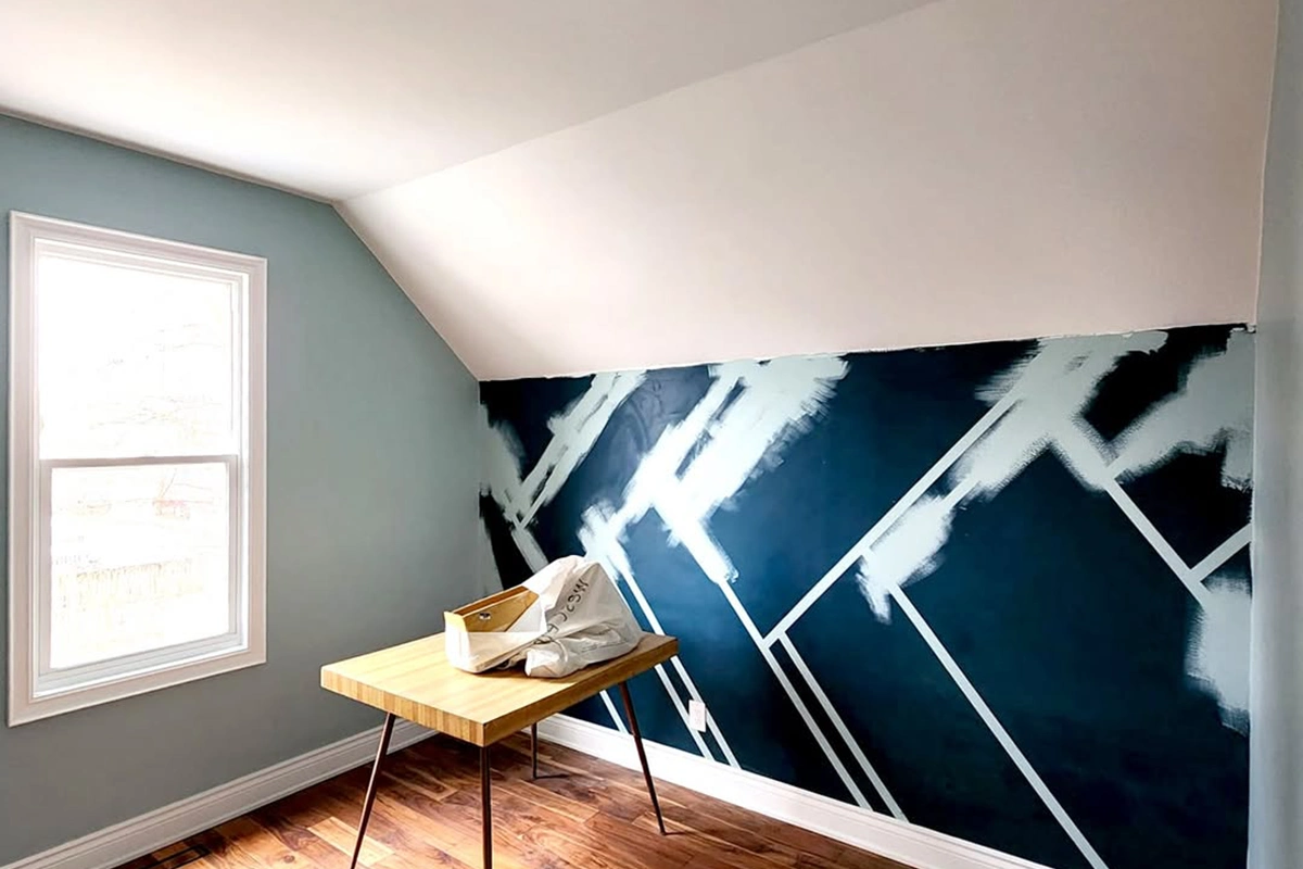 Geometric wall paint in progress — Commercial Priming & Painting Services in Toronto by Express Drywall Services