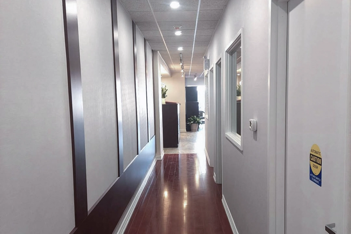 Modern hallway built with fire-rated assemblies for Commercial Fire and Sound Separation in Toronto by Express Drywall Services.