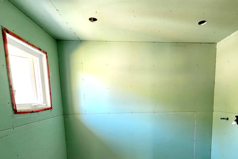 Green board drywall installed in commercial washroom – Express Drywall Services Toronto