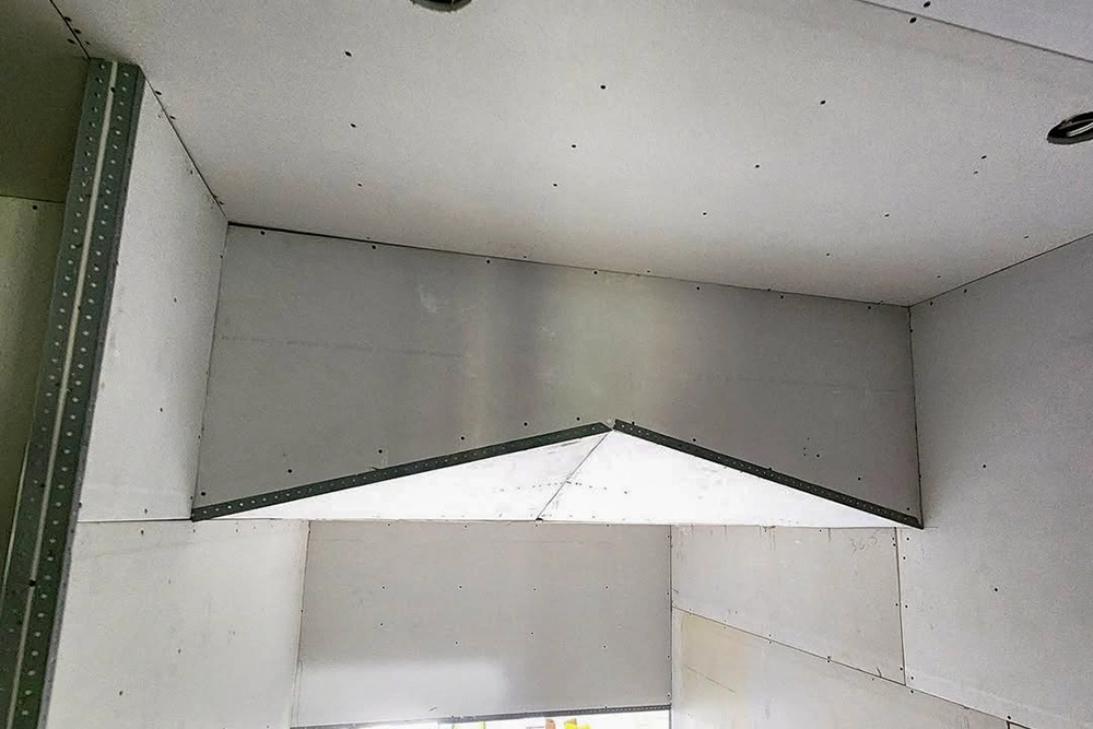 Precision drywall arch detail during commercial installation by Express Drywall Services — Commercial Custom Archways and Designs in Toronto.