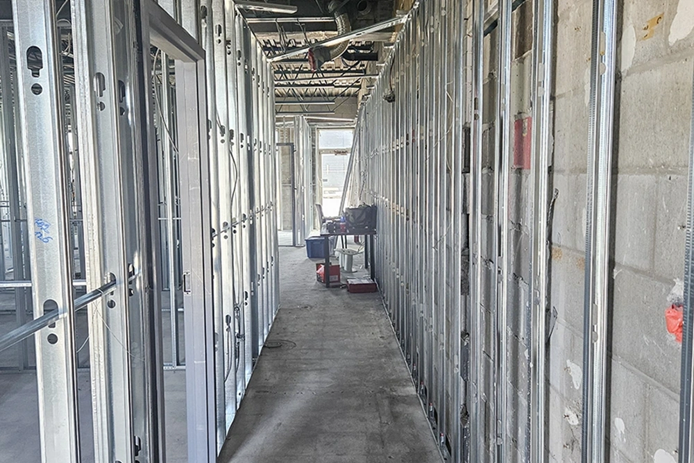 Steel stud framing for commercial wall systems in progress – Commercial Framing in Toronto by Express Drywall Services.