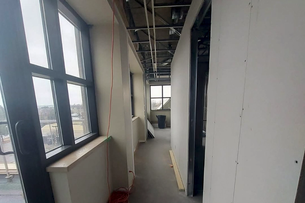 Framed hallway under construction for Commercial Fire and Sound Separation in Toronto by Express Drywall Services.