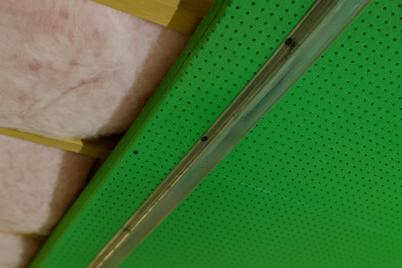 Soundproofing insulation and resilient channels on ceiling during soundproofing in Richmond Hill.